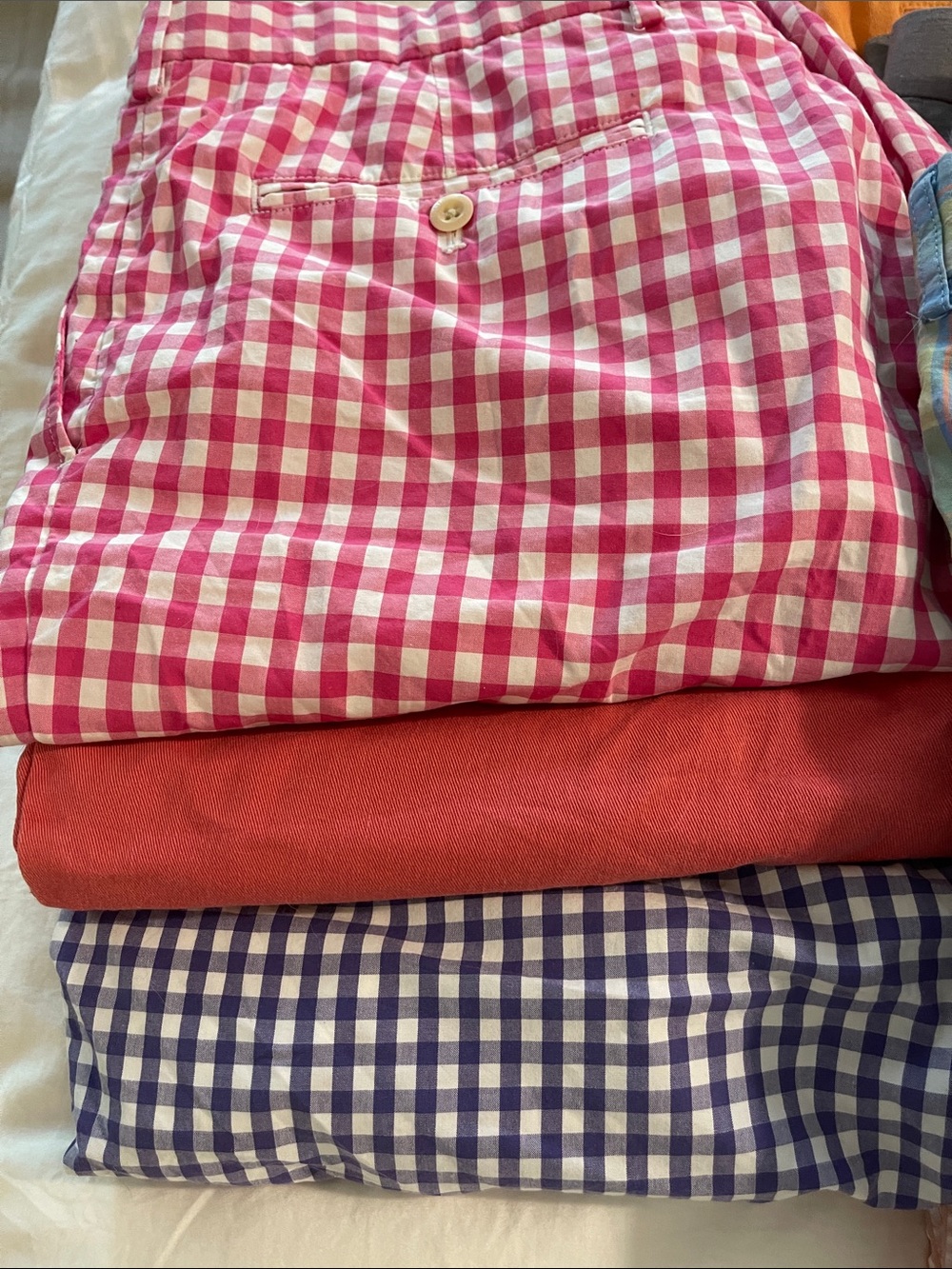 Stack of Casual Shorts in Blue Plaid, Pink Seersucker, Tan, Gray & Orange